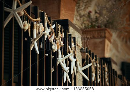 Monterosso street view with decoration on fense in Cinque Terre in Italy 