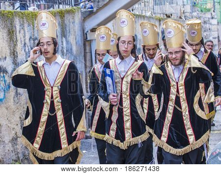 JERUSALEM - MARCH 13 : Ultra Orthodox boys during Purim in Mea Shearim Jerusalem on March 13 2017 Purim is a Jewish holiday celebrates the salvation of the jews from genocide in ancient Persia