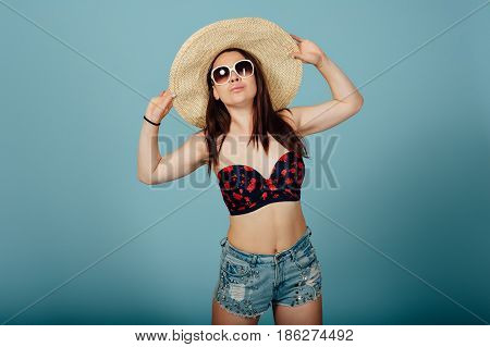 Playful Girl In Hat And Sunglasses