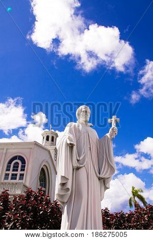 Guam island,USA - May 25, 2016:Statue of Missionary Saint Bitoresu at Dulce Nombre de Maria Cathedral Basilica of Guam Island,USA
