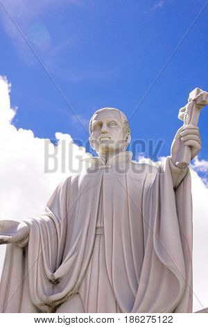 Guam island,USA - May 25, 2016:Statue of Missionary Saint Bitoresu at Dulce Nombre de Maria Cathedral Basilica of Guam Island,USA
