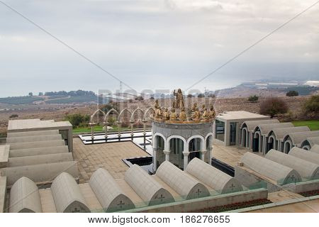 GALILEE, ISRAEL - DECEMBER 3: The statues of Jesus and Twelve Apostles in Domus Galilaeae on the Mount of Beatitudes near the Sea of Galilee, Israel on December 3, 2016