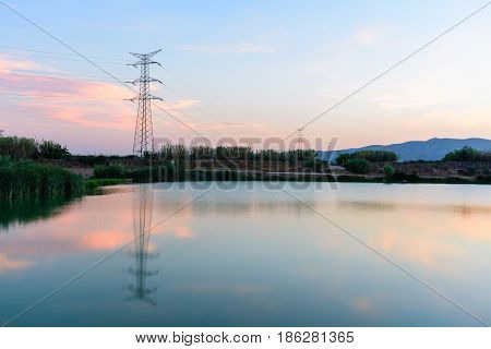 High voltage post. Highvoltage tower sky background.