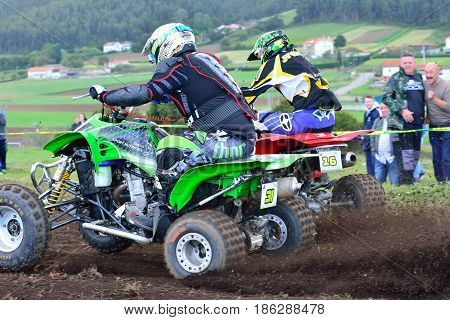 Unidentified Racers Rides A Quad Motorbike.