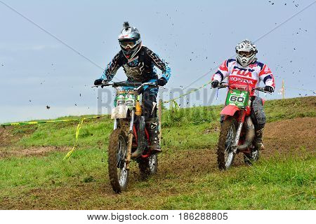 Unidentified Racer Rides A Classic Motorcycle.