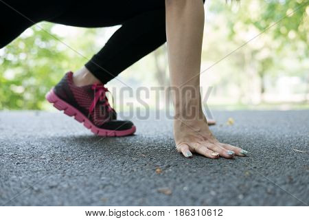Sportswoman Athletic On Starting Point And Ready For Competition. Healthy Young Asian Athlete Woman