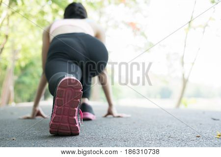 Sportswoman Athletic On Starting Point And Ready For Competition. Healthy Young Asian Athlete Woman