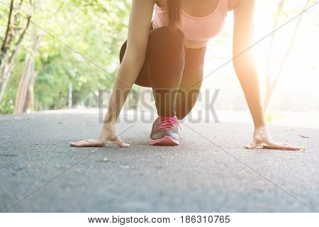 Sportswoman Athletic On Starting Point And Ready For Competition. Healthy Young Asian Athlete Woman