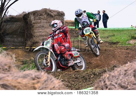 Unidentified Racers Rides A Classic Motorcycle.