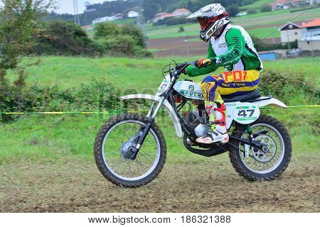 Unidentified Racer Rides A Classic Motorcycle.