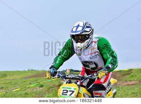 Unidentified Racer Rides A Classic Motorcycle.