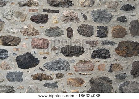 stone wall fieldstone and concrete natural building texture