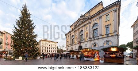 Christmas Market With Huts Lit And Decorated