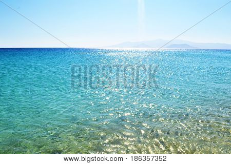 sunbeams on Aegean sea Naxos island Cyclades Greece