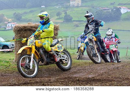Unidentified Racers Rides A Classic Motorcycle.