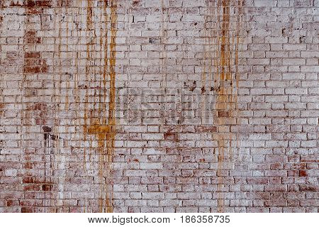 Background Of Old Vintage Dirty Brick Wall With Peeling Plaster