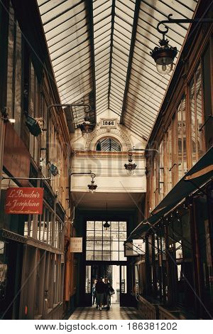 PARIS, FRANCE - MAY 13: Passage Jouffroy street view on May 13, 2015 in Paris. With the population of 2M, Paris is the capital and most-populous city of France