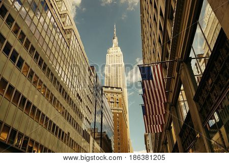New York City - SEP 11: Empire State Building viewed from street on September 11, 2015 in New York City. With 8.5M, New York City is the is the most populous city in the United States.
