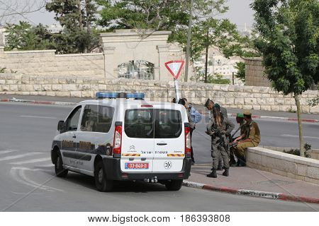 JERUSALEM, ISRAEL - APRIL 30, 2017: Israeli policemen provide security in the Old City of Jerusalem.