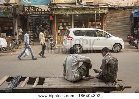 DELHI INDIA - JUN 18 : free time of worker in chawri bazar in old delhi of delhi on june 18 2015 india