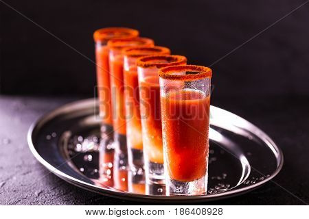 Bloody Mary Cocktail With Chili Pepper, Ice And Celery.