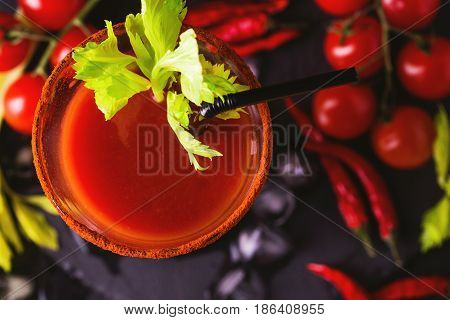 Bloody Mary Cocktail With Chili Pepper, Ice And Celery.