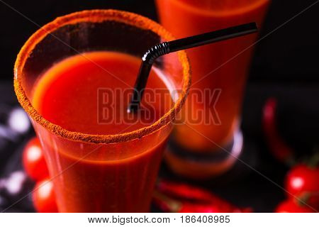 Bloody Mary Cocktail With Chili Pepper, Ice And Celery.