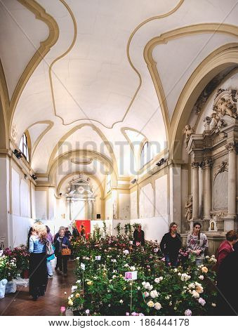 Este Italy 22 Apr 2017 - customers in a florist shop set up inside a deconsecrated church