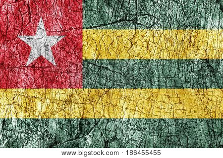 Grudge stone painted Togo flag close up