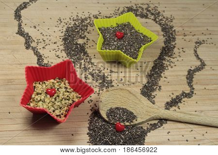Chia and hemp seeds/ These are a chia and hemp seeds in  star bowls.