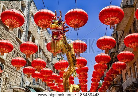 Jerusalem Israel October 03 2016: Street Gerbert Samuel decorated with red Chinese lanterns and golden Chinese dragon in Jerusalem Israel City chinese style dragons lanterns red