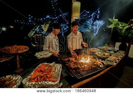 8 january 2017 Wedding party. Dalat, Vietnam. Seefood bbq outdoors at picnic, party, roasted meat and seafood grill at grate. 