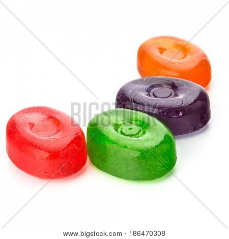 Four colorful fruit hard sugar candies,  boiled sweeties or sugar plums isolated on white background cutout