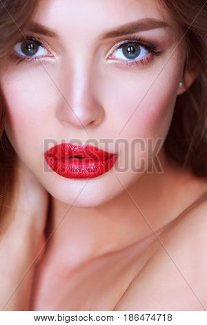 Beautiful woman skin with red lips on white background