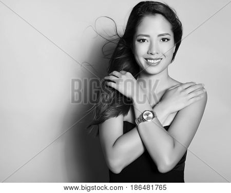 beautiful young asian woman with wrist watch