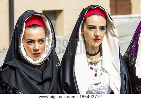 CAGLIARI, ITALY - MAY 1, 2014: 358 Religious procession of Sant'Efisio - portrait of beautiful girls dressed in traditional Sardinian costume - Sardinia