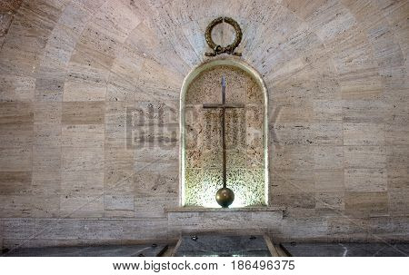SANTO DOMINGO DOMINICAN REPUBLIC - Catholic cross on the stone wall in catholic church.