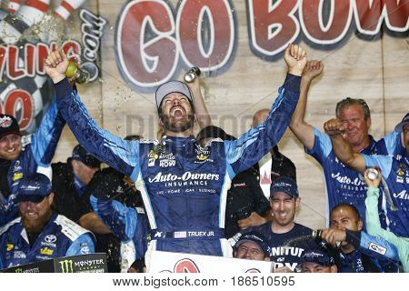 May 13, 2017 - Kansas City, Kansas, USA: Martin Truex Jr. (78) takes the checkered flag and wins the Go Bowling 400 at Kansas Speedway.