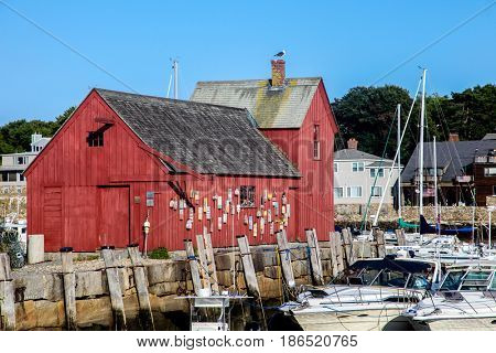ROCKPORT-AUGUST 08:  A view of Rockport Harbour and the red building know as Motif Number One, Rockport, Massachusetts, New England, USA on August 08, 2014.