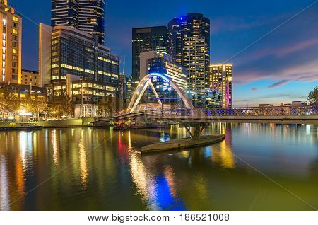 Beautiful Cityscape At Night With Bridge Across River