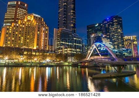 Beautiful Cityscape At Night With Bridge Across River