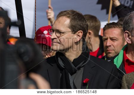 BERLIN - MAY 01 2016: Governing Mayor of Berlin Michael Mueller (center). Members of trade unions workers and employees at the demonstration on the occasion of Labour day.