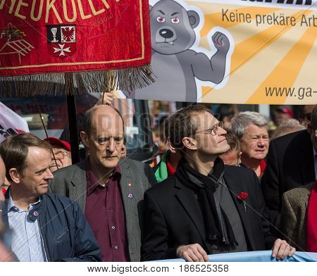 BERLIN - MAY 01 2016: Governing Mayor of Berlin Michael Mueller (right). Members of trade unions workers and employees at the demonstration on the occasion of Labour day.