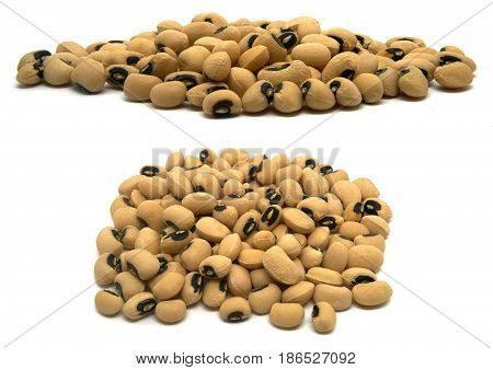 A small handful of Black eye beans. Beans isolated on a white background. Close-up.