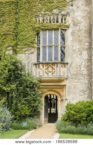 LACOCK, WILTSHIRE, 21ST JUNE 2016 - The Oriel window at Lacock Abbey Wiltshire UK the subject of the first photograph pioneered by William Henry Fox Talbot