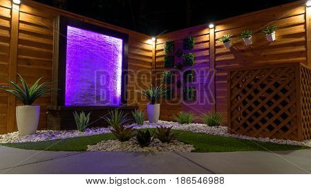 Night Scene Landscape design concept for small spaces with purple water feature