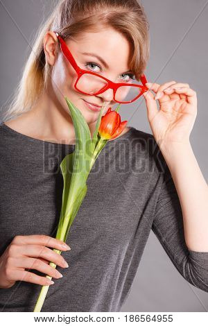 Beauty Woman With Tulip Flower.