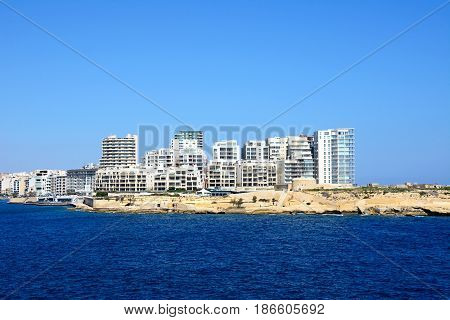 View of Fort Tigne with modern buildings to the rear seen from Valletta Sliema Malta Europe.
