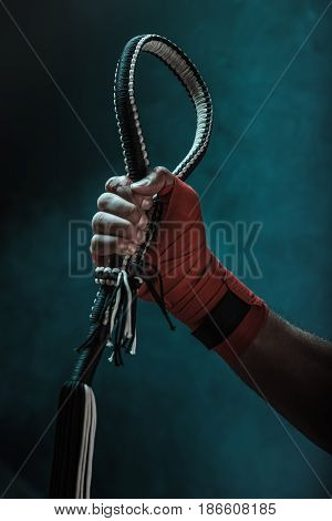 Close-up Partial View Of Muay Thai Fighter Holding Mongkhon, Action Sport Concept