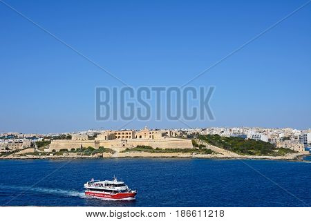 VALLETTA, MALTA - MARCH 30, 2017 - View of Manoel Fort on Manoel Island seen from Valletta with Sleima to the rear Valletta Malta Europe, March 30, 2017.